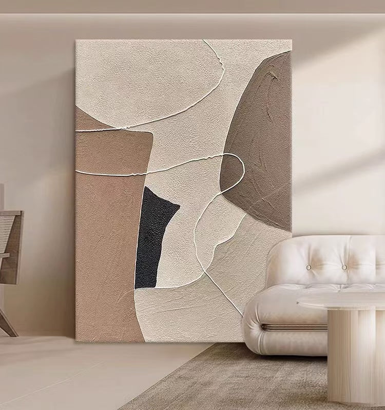 Contemporary abstract artwork displaying fluid, organic shapes in various shades of beige and dark brown, creating a sense of calm movement.